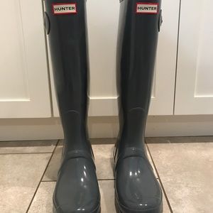 Gray tall glossy hunter boots
